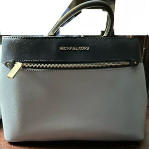MK light and dark blue purse.